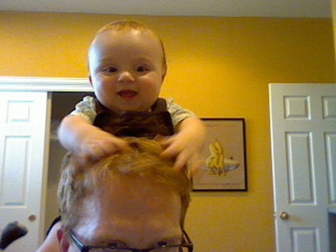 baby on shoulders